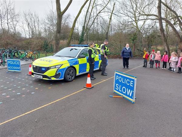 PCs talking to reception children at Stukeley Meadows Primary School