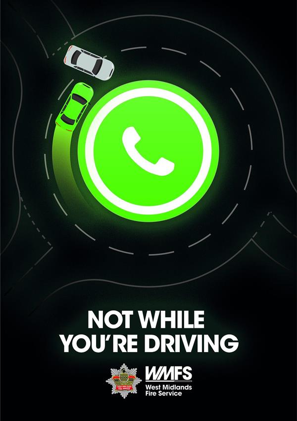 A graphic showing a phone call symbol representing the centre of a traffic island, with a road around it and a depiction of a green car about to collide with a white car. Text beneath reads 'Not while you're driving'.