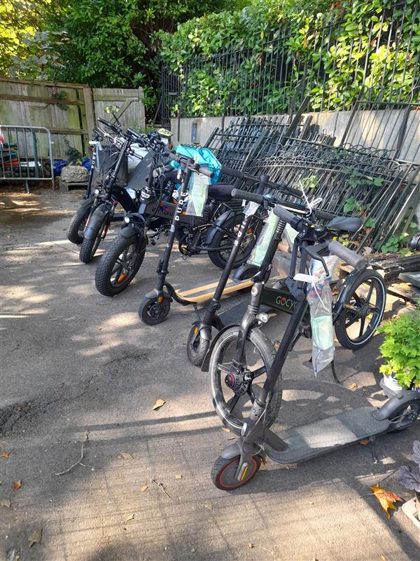 A collection of seized e-bikes and e-scooters