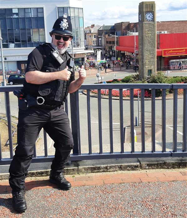 PC Manus on the bridge overlooking Rhyl High Street
