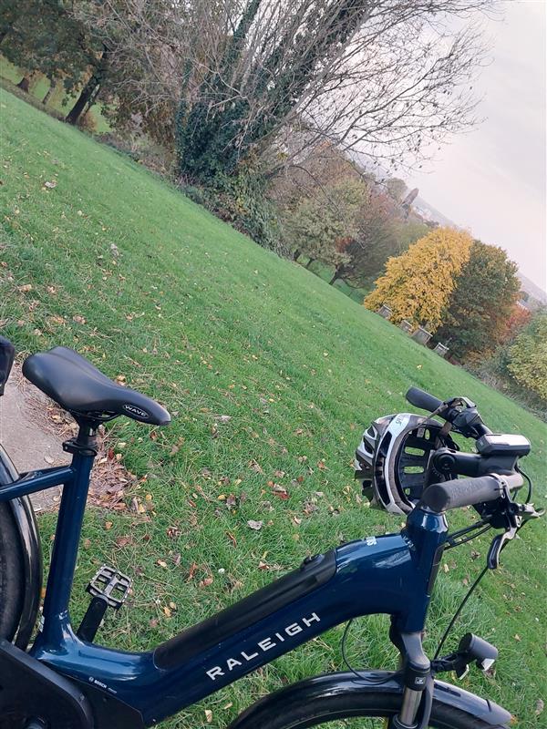 Image of police bike with Rykneld Park in the foreground