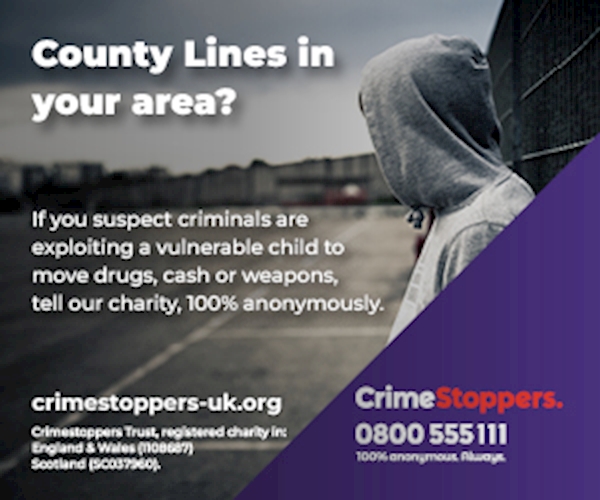 A person in a hoodie standing next to a fence

AI-generated content may be incorrect.