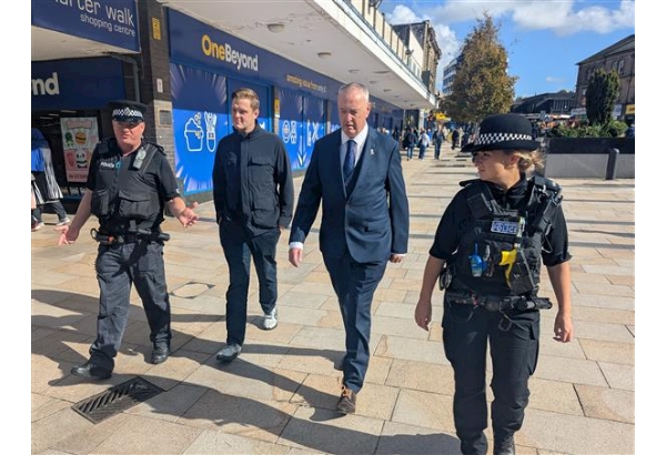 PCC Clive Grunshaw with Oliver Ryan MP and officers