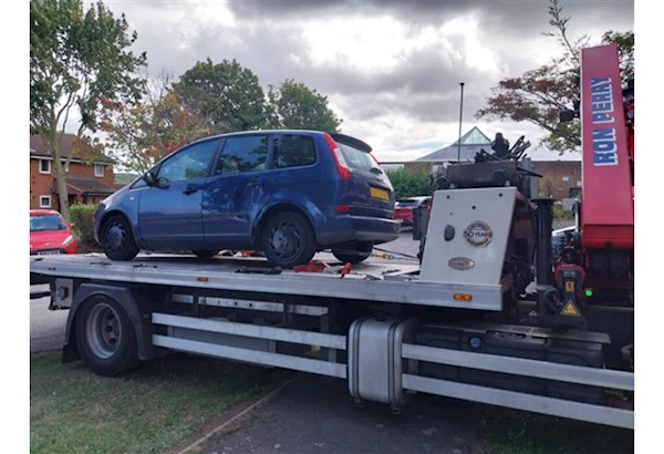 Vehicle on recovery truck