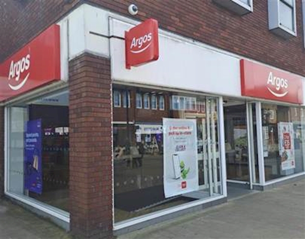 A store front with a sign

AI-generated content may be incorrect.