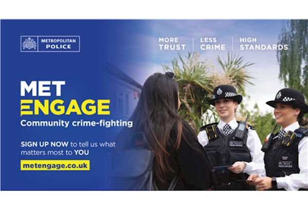 Image shows two officers discussing Met Engage