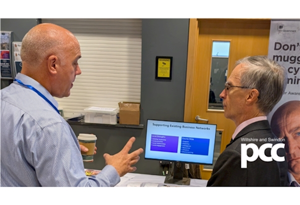 Business Crime Reduction Partnership Officer, Steve Davis, speaking to south west Wiltshire MP, Dr Andrew Murrison