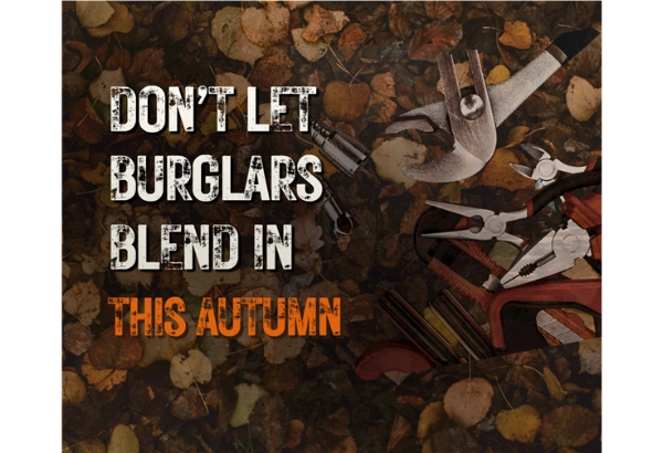 Don't let burglars blend in this Autumn text on a faded graphic of autumn leaves and tools such as wrenches