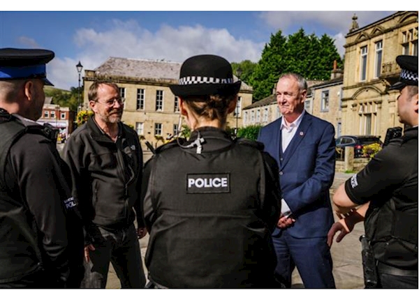 PCC Clive Grunshaw with Andy MacNae MP with police officers in Bacup