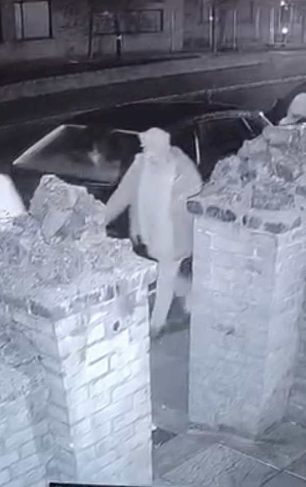 A group of people walking on a brick wall

AI-generated content may be incorrect.