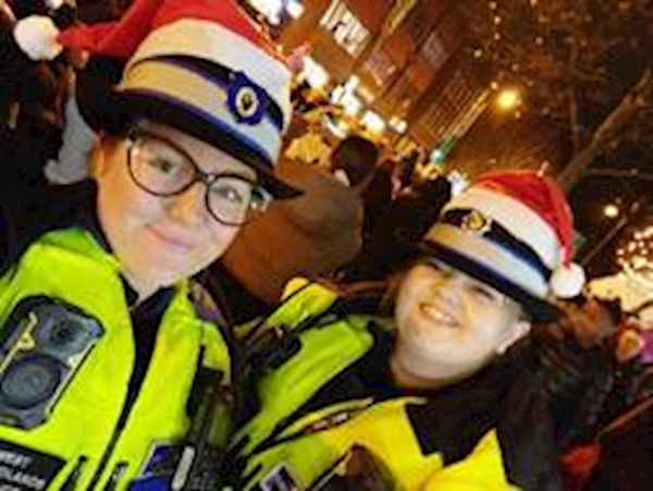 A selfie of two people in clothing

AI-generated content may be incorrect.