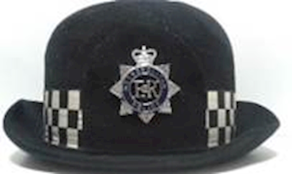 A black hat with a badge on it

AI-generated content may be incorrect.