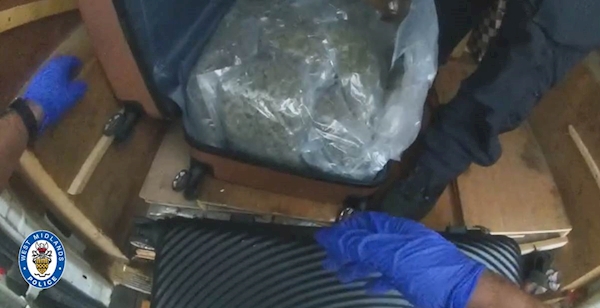 The moment cannabis is found hidden in suitcases in a van