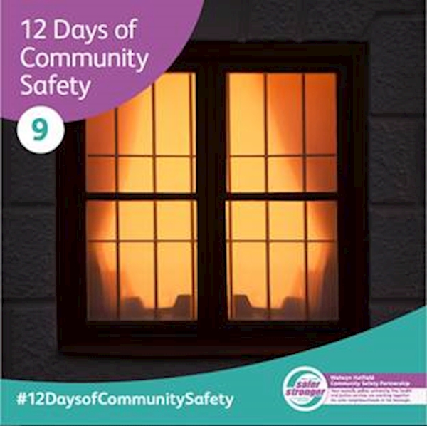 A window with a lit up window

AI-generated content may be incorrect.