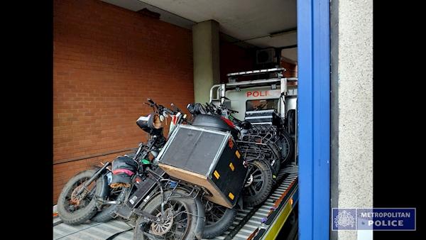 A group of motorcycles on a ramp

AI-generated content may be incorrect.