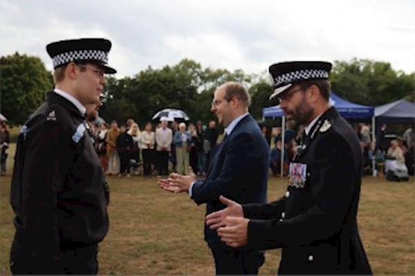 A group of men in uniform talking

AI-generated content may be incorrect.
