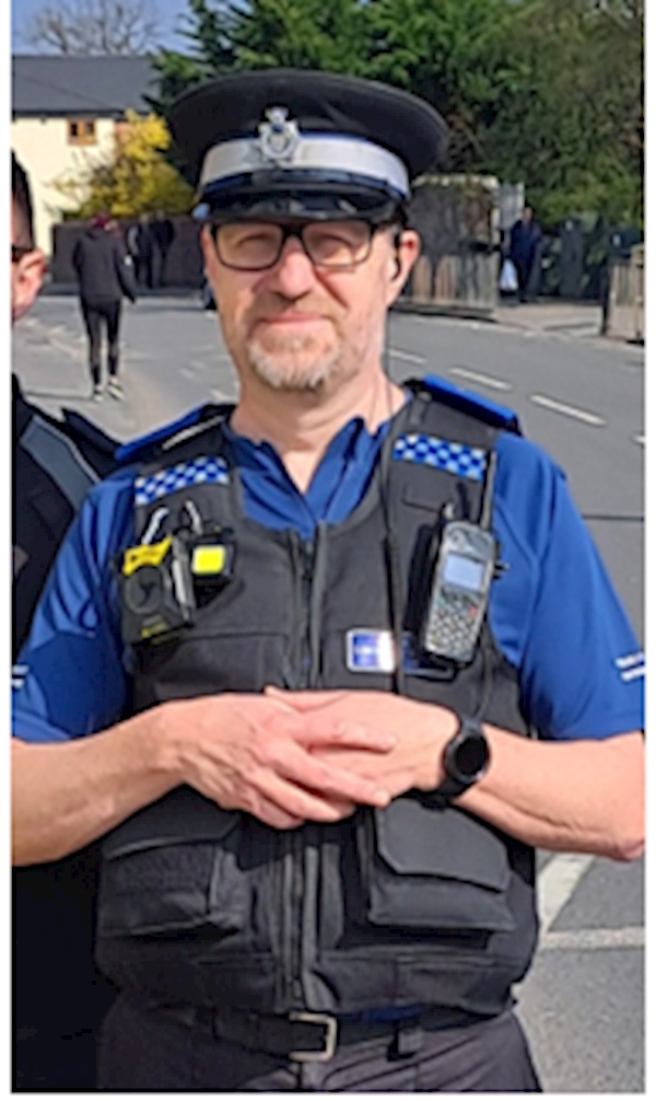 A person wearing a helmet and a vest

AI-generated content may be incorrect.
