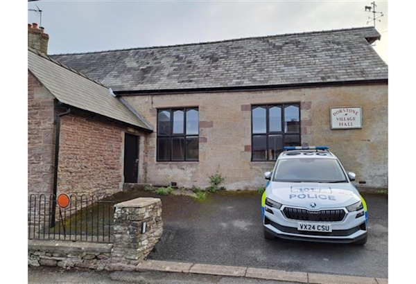 Police car parked in front of Dorstone village hall