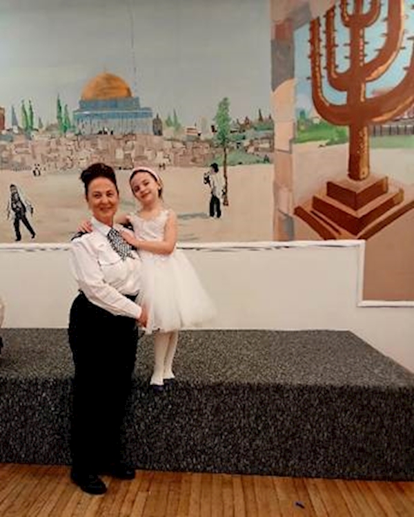 A person and a child posing for a picture