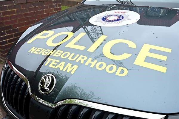 A close-up of a police car

AI-generated content may be incorrect.